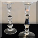 G26. Glass candlesticks. 